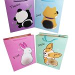 BOLSA IMPRESA CON POMPÓM 26 x 32 cm 4 DISEÑOS ANIMALES